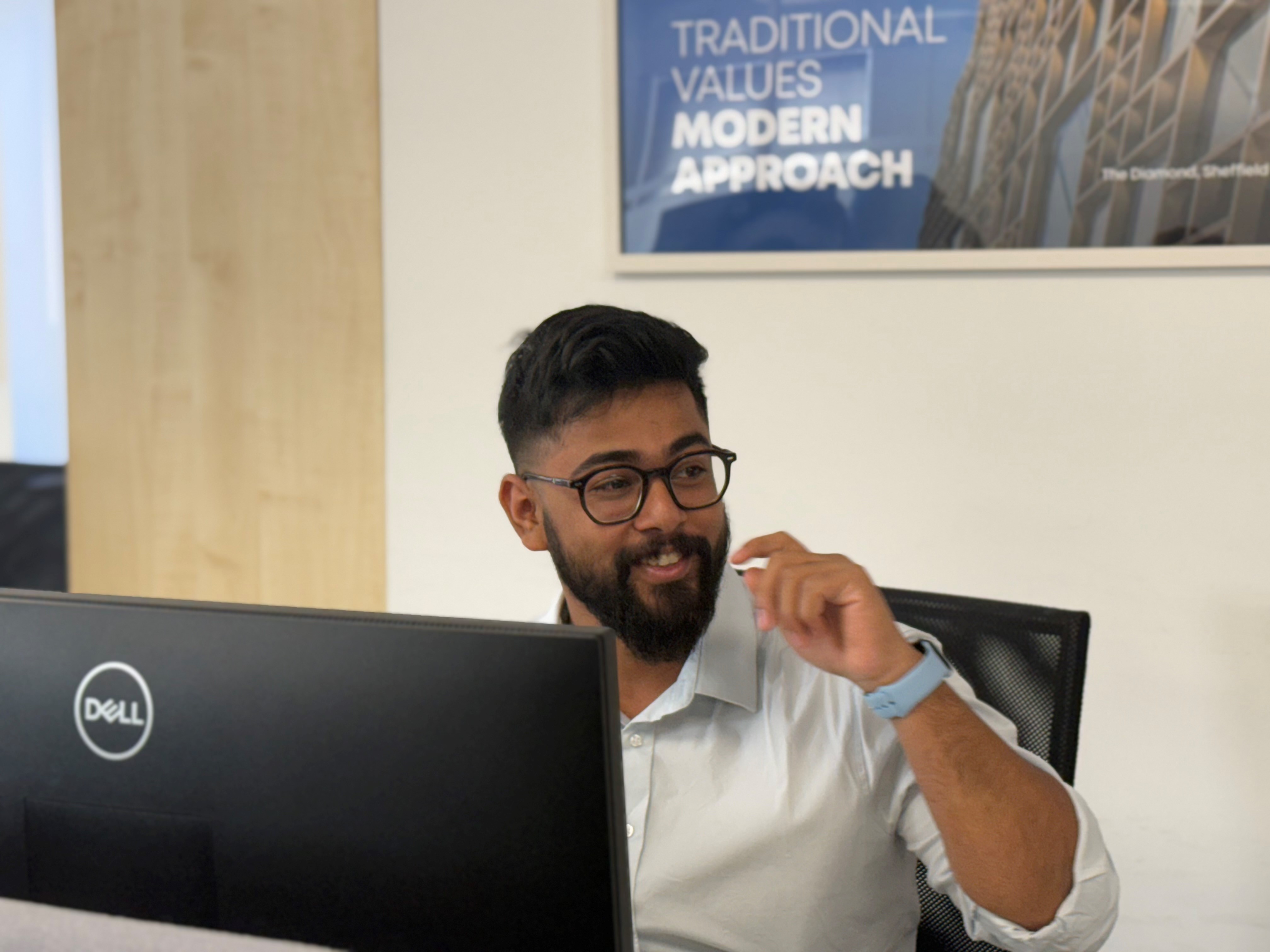 A Software Testing Consultant performing Functional Testing services on a tablet device with screen showing data and results