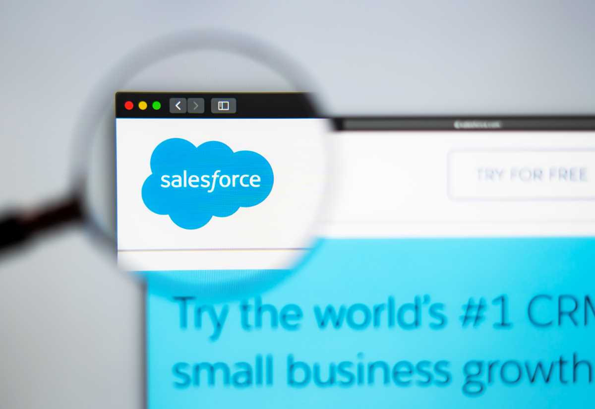 Magnifying glass over the Salesforce logo on a website