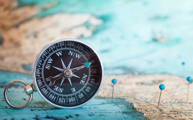 A compass showing how software testing training can take you in the right direction